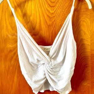 C’ina White twist crop top.